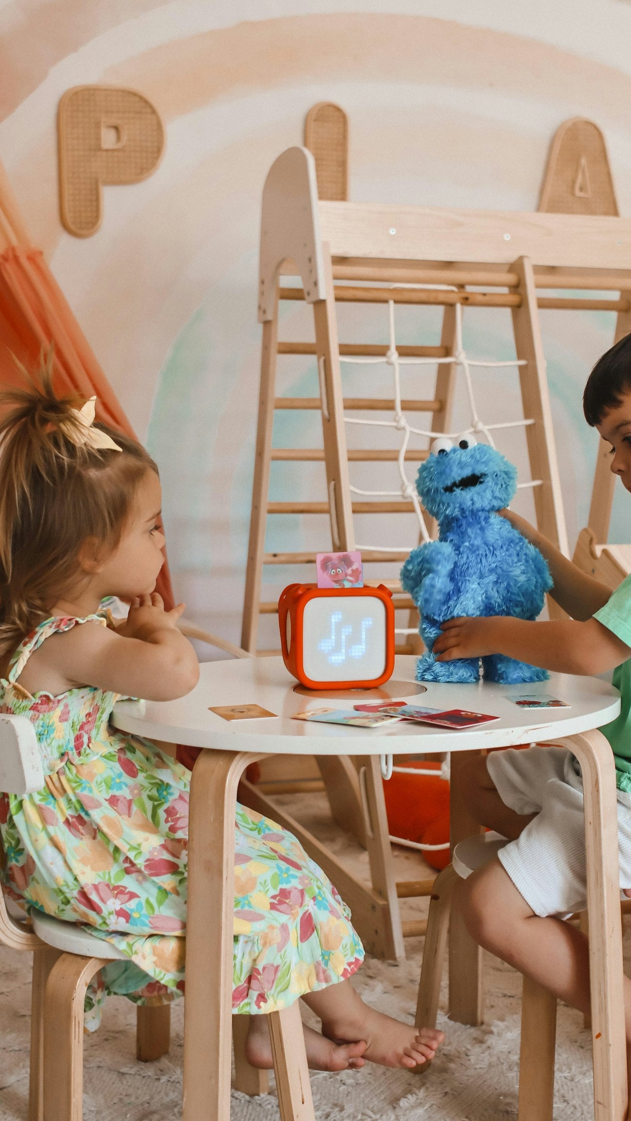 Children around a Yoto Player